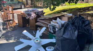 Junk hauling team near me loading unwanted appliances