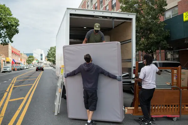 Truck full of assorted furniture: Junk Removal Inc